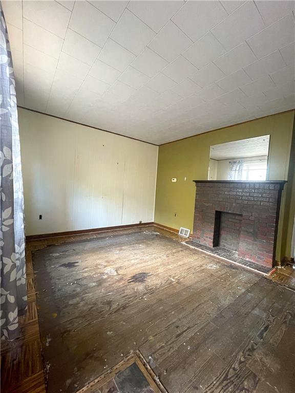 323 Hancock Street Pittsburgh, PA 15219 - Photo 3 of 41 a view of empty room with a fireplace