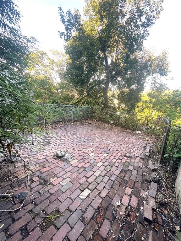 323 Hancock Street Pittsburgh, PA 15219 - Photo 33 of 41 a view of a yard with a trees
