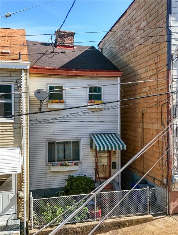 323 Hancock Street Pittsburgh, PA 15219 - Photo 41 of 41 a front view of a house with windows