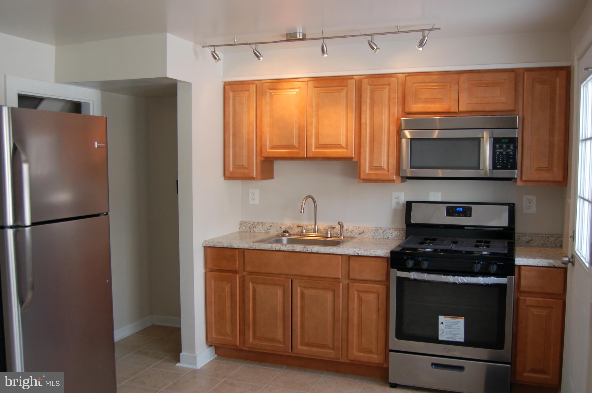 2016 Kelmore Road Baltimore, MD 21222 - Photo 4 of 27 Kitchen-New Cabinet, Counter and Sink