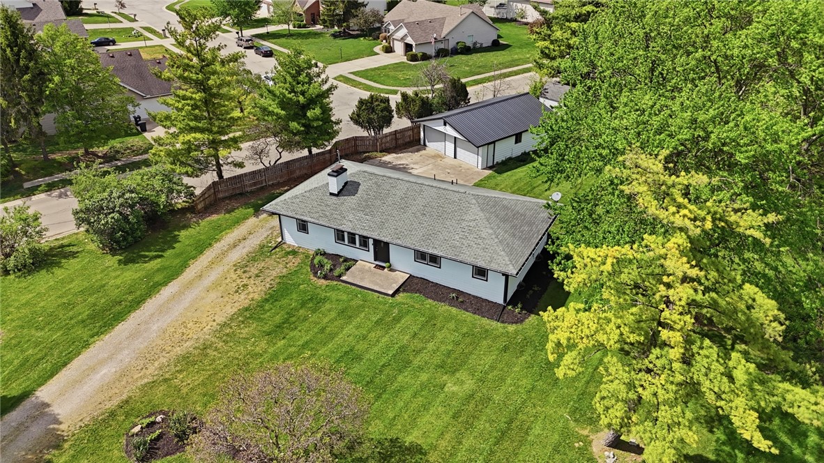 3991 Benner Road Miamisburg, OH 45342 - Photo 3 of 44 This charming residence offers a peaceful suburban setting with ample green space.