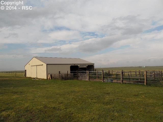 37285 Harrisville Road Calhan, CO 80808 - Photo 23 of 24 50 X 40 Barn has Drive Through Doors ~ Automatic Water ~ Stalls ~ Corrals ~ Electric ~