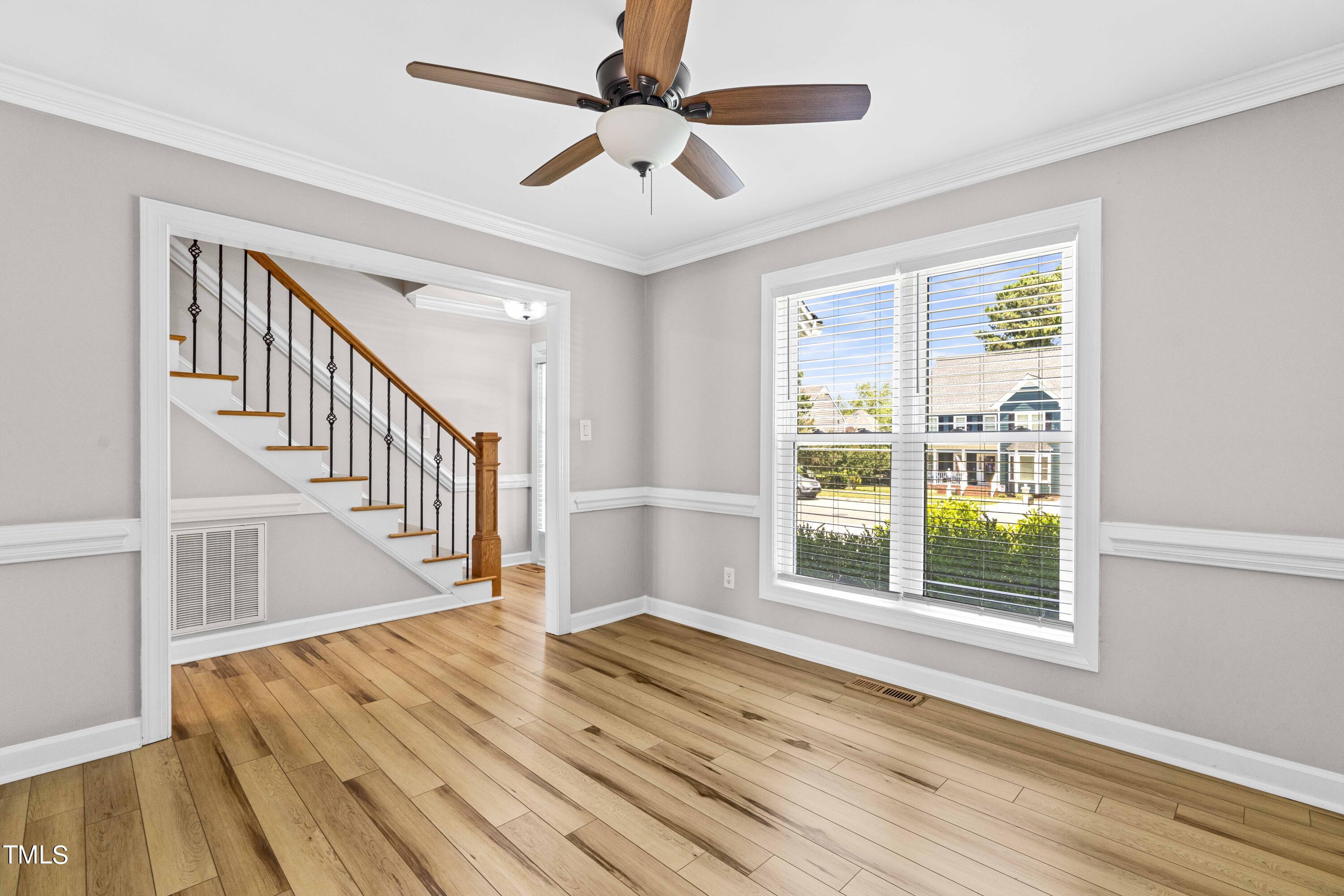 1206 Rainesview Lane Apex, NC 27502 - Photo 11 of 26 a view of an entryway with wooden floor