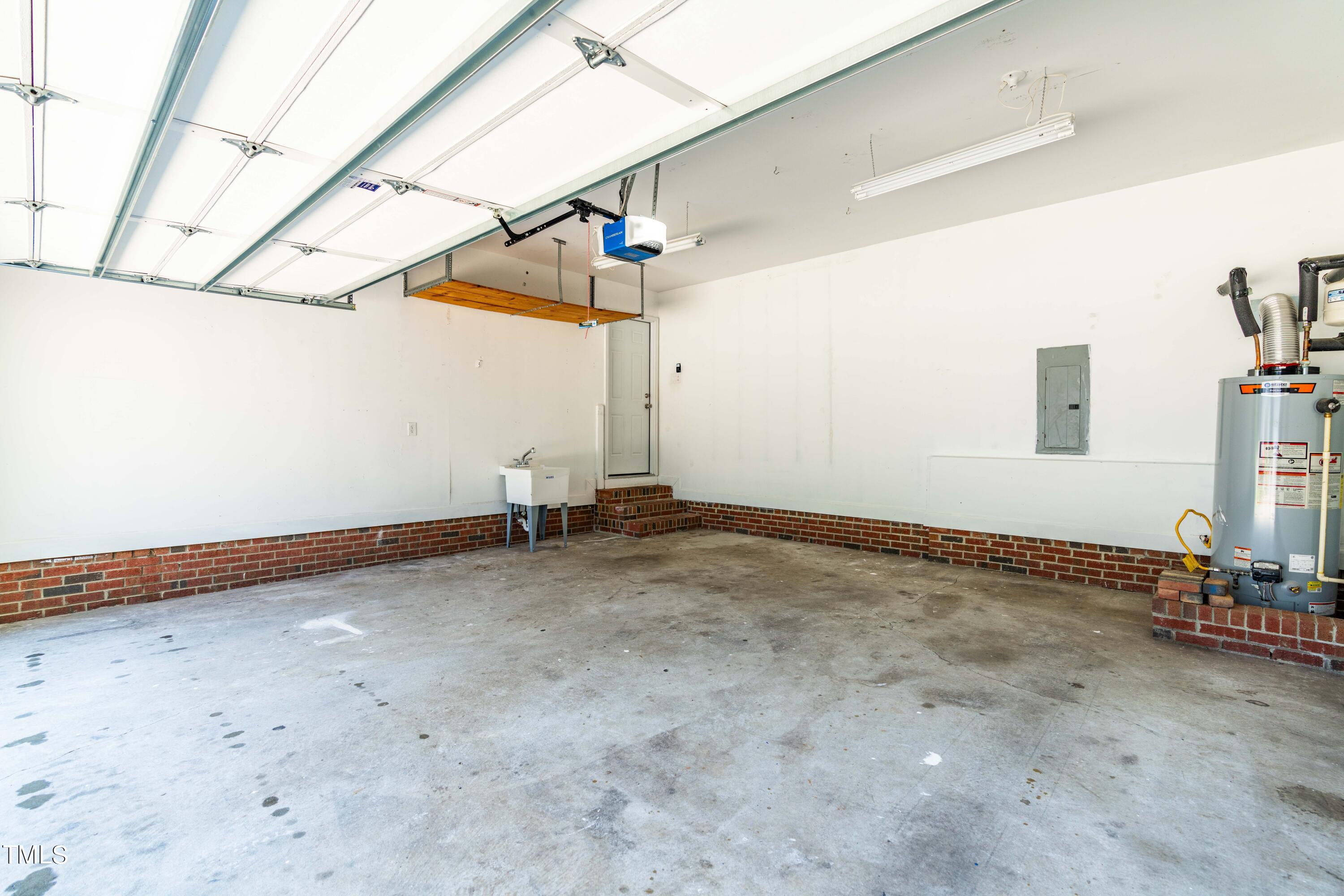 1206 Rainesview Lane Apex, NC 27502 - Photo 22 of 26 a view of a room with rack and stairs
