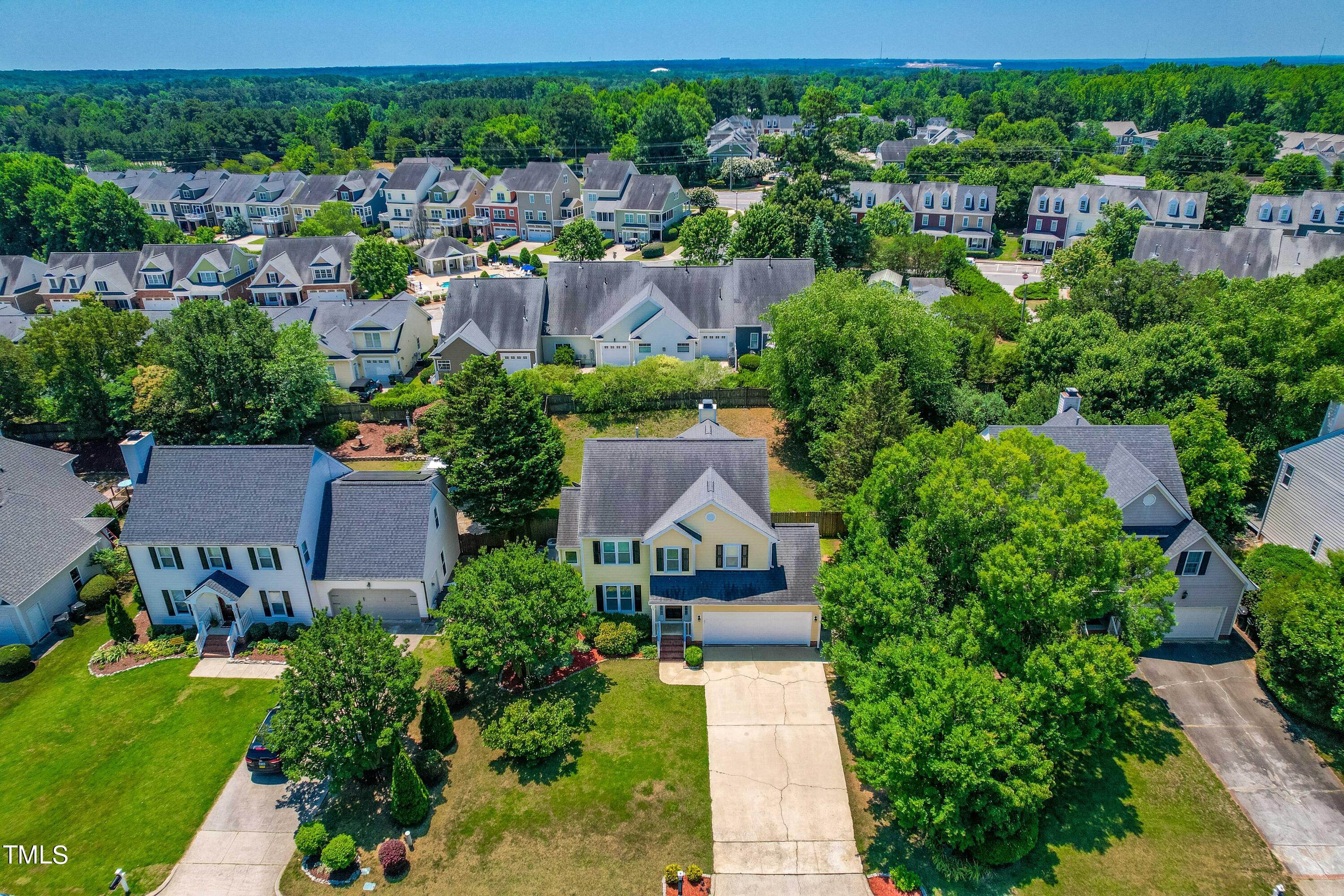 1206 Rainesview Lane Apex, NC 27502 - Photo 26 of 26 an aerial view of a house with a garden
