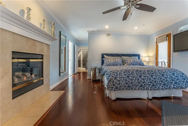 a bathroom with a granite countertop double vanity sink mirror and