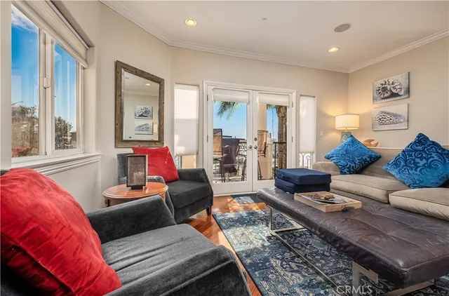 a dining hall with granite countertop a dining table chairs and mirrors