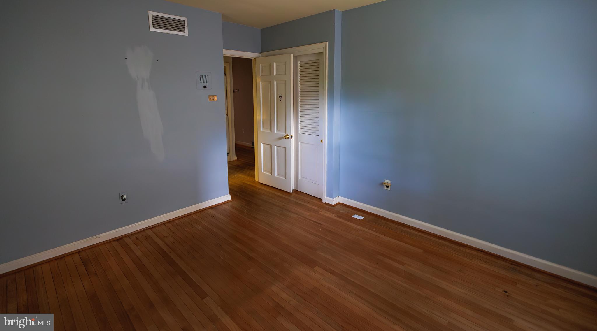 321 Villanova Road Glassboro, NJ 08028 - Photo 21 of 29 a view of an empty room with wooden floor