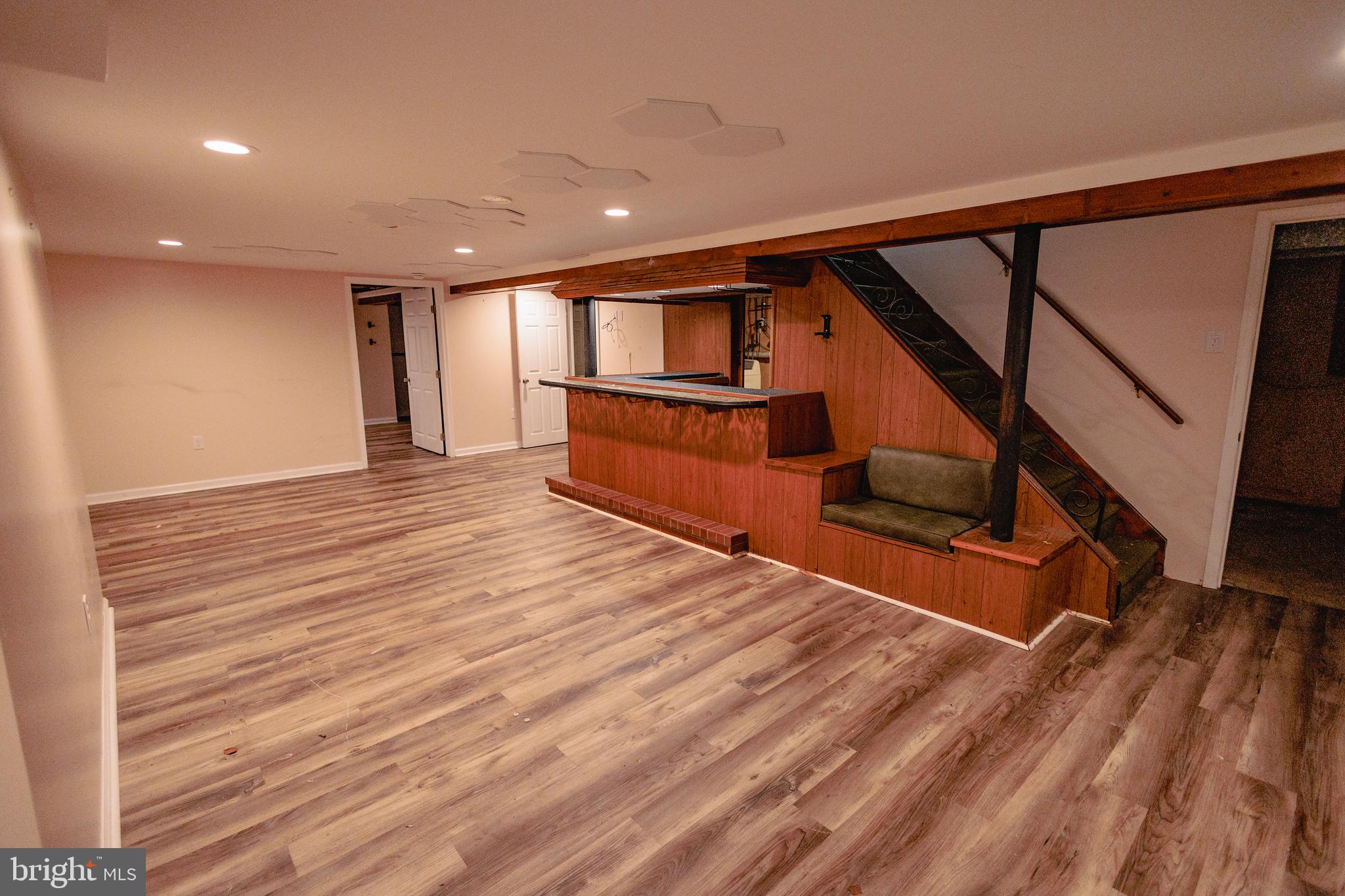 321 Villanova Road Glassboro, NJ 08028 - Photo 26 of 29 a view of entryway with wooden floor and stairs