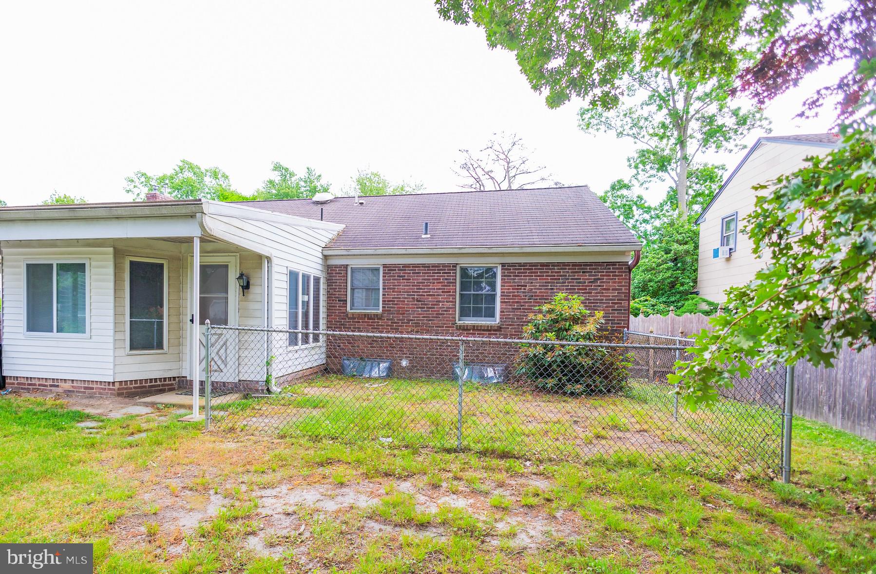 321 Villanova Road Glassboro, NJ 08028 - Photo 3 of 29 a view of a house with a yard and sitting area