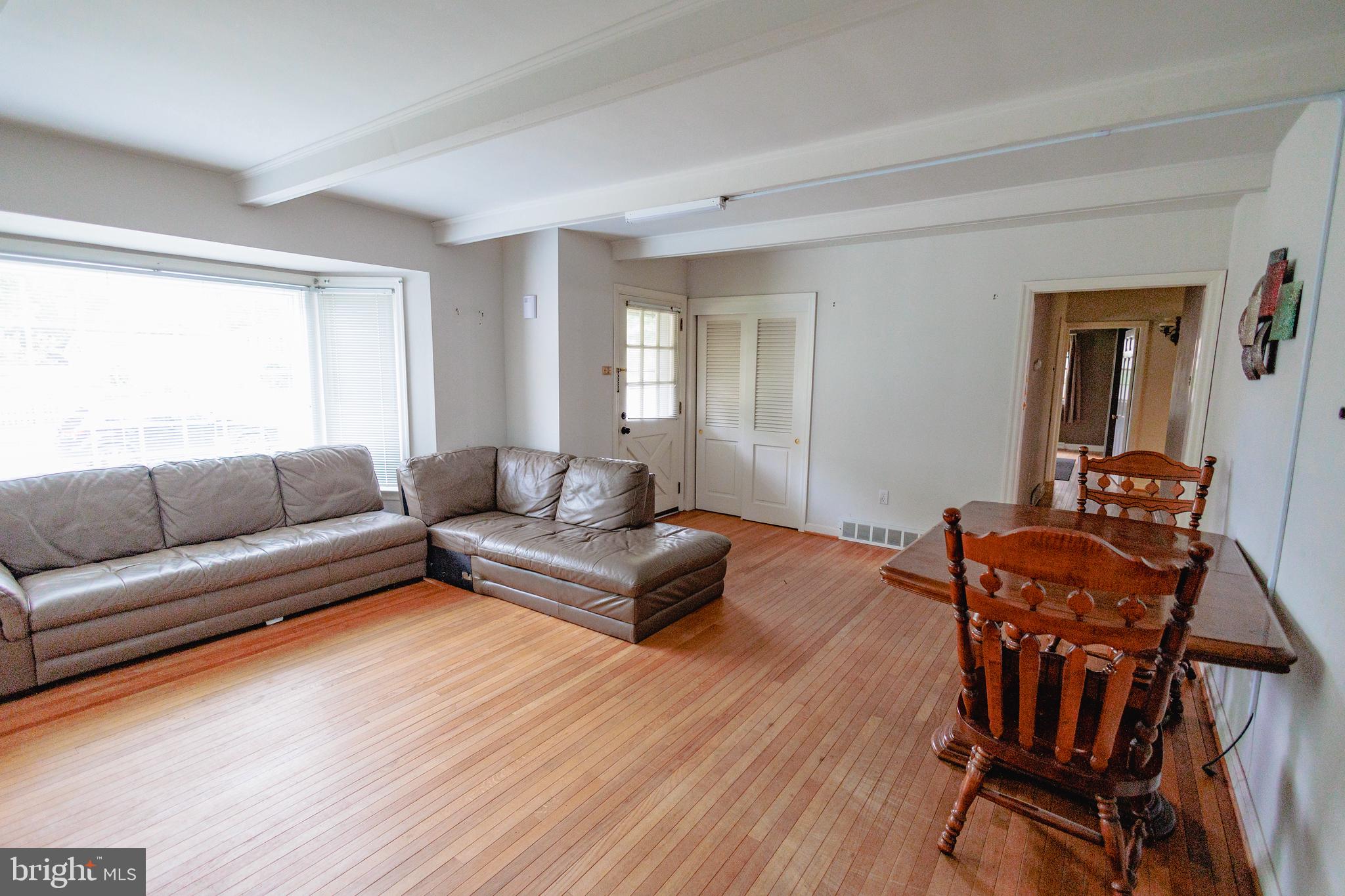 321 Villanova Road Glassboro, NJ 08028 - Photo 7 of 29 a living room with furniture and a wooden floor