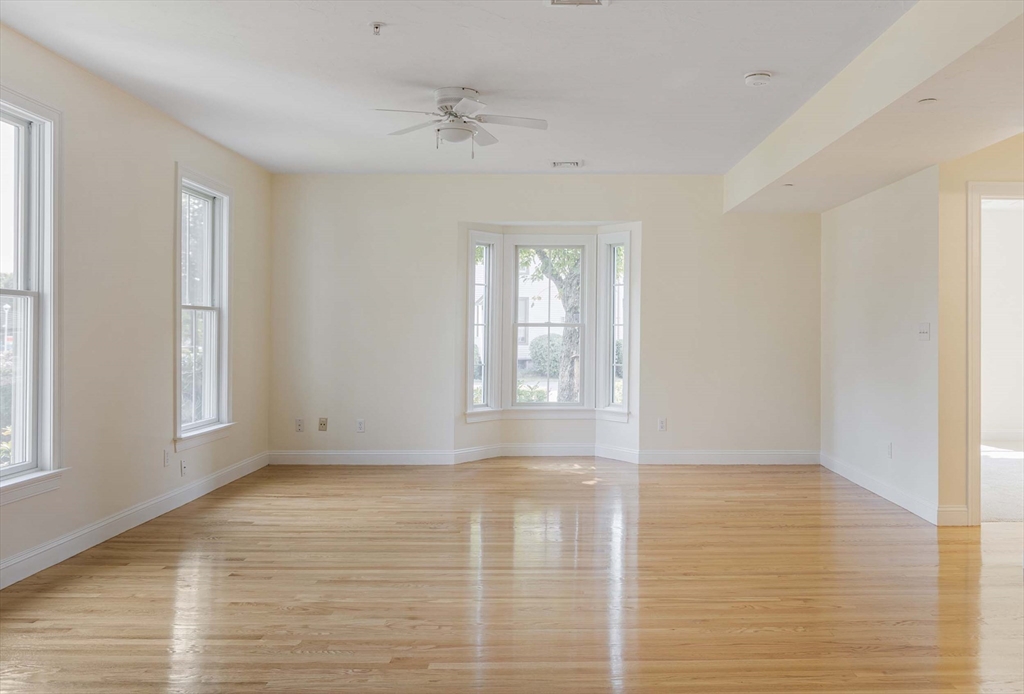 756 Washington Street, Unit A Canton, MA 02021 - Photo 13 of 20 a view of an empty room with a window