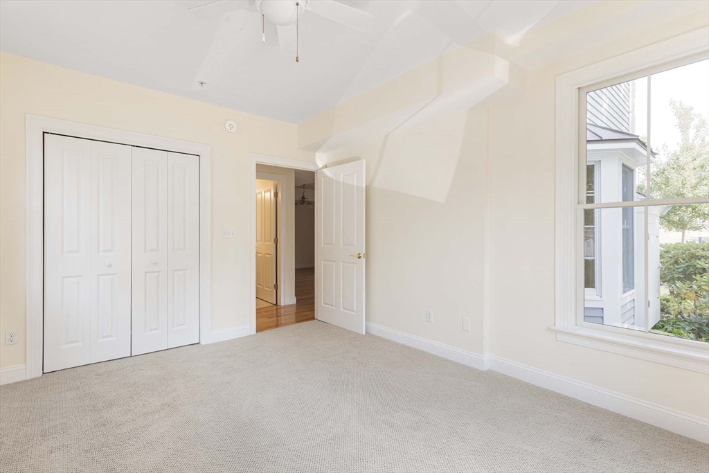 756 Washington Street, Unit A Canton, MA 02021 - Photo 9 of 20 a view of an empty room with a window