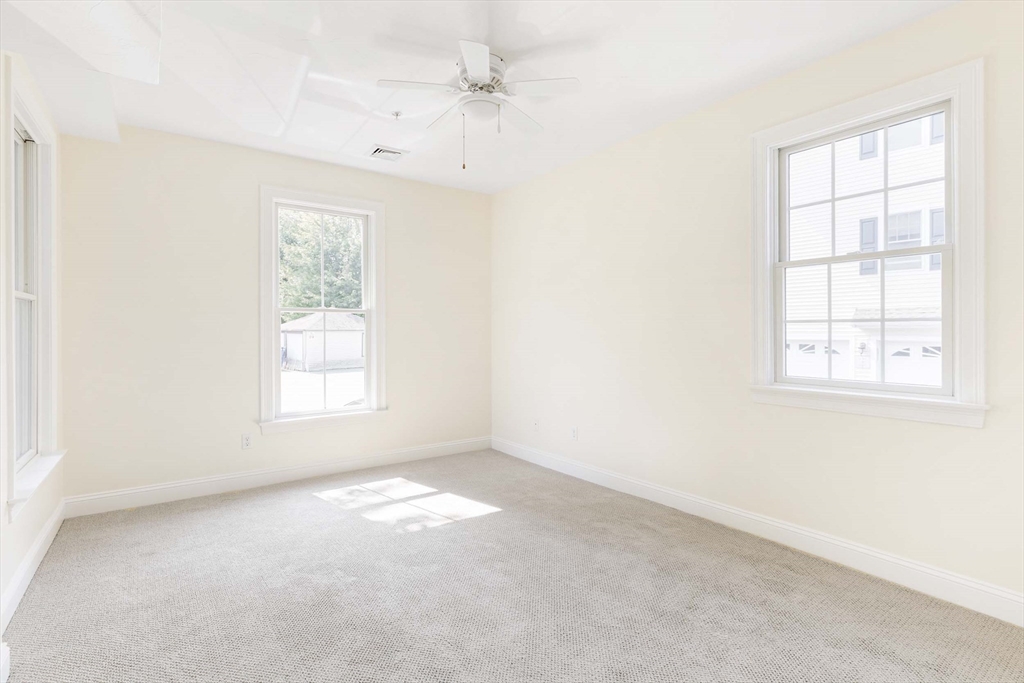 756 Washington Street, Unit A Canton, MA 02021 - Photo 10 of 20 an empty room with a window