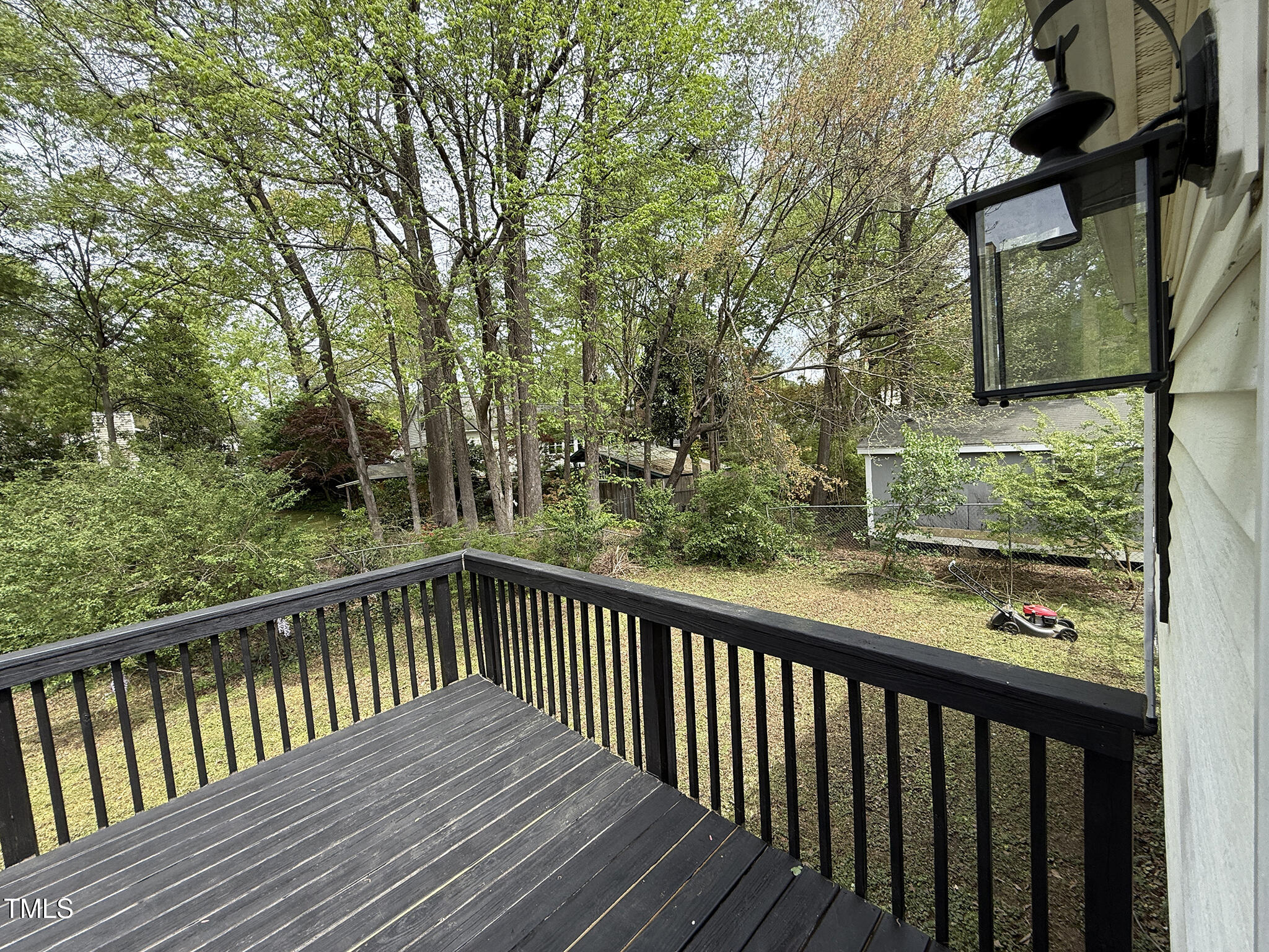 215 Walnut Street Cary, NC 27511 - Photo 24 of 33 a view of a balcony with wooden floor