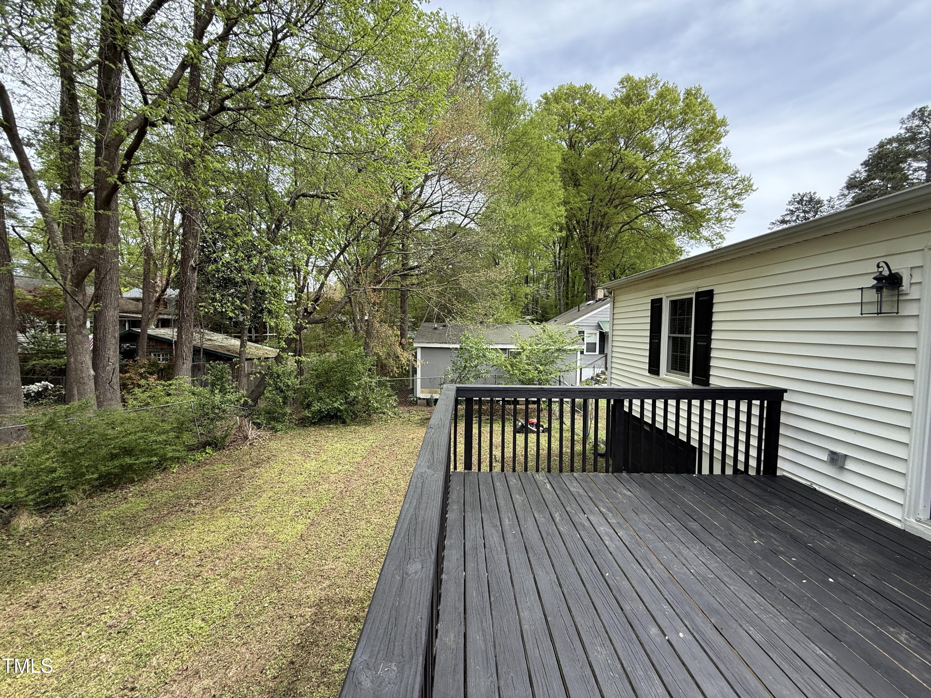 215 Walnut Street Cary, NC 27511 - Photo 25 of 33 a view of a wooden deck