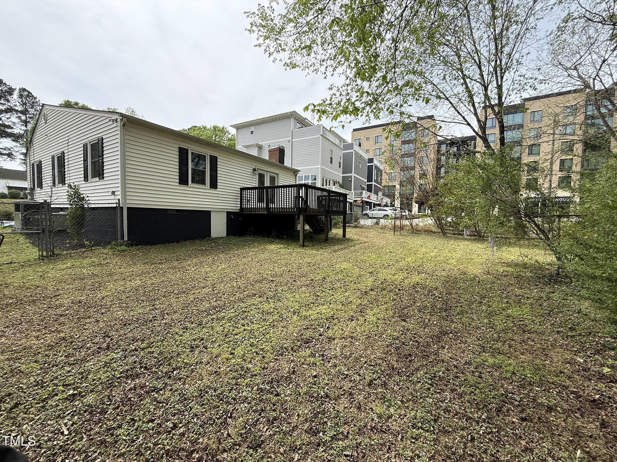 215 Walnut Street Cary, NC 27511 - Photo 27 of 33 a view of a house with a yard and sitting area