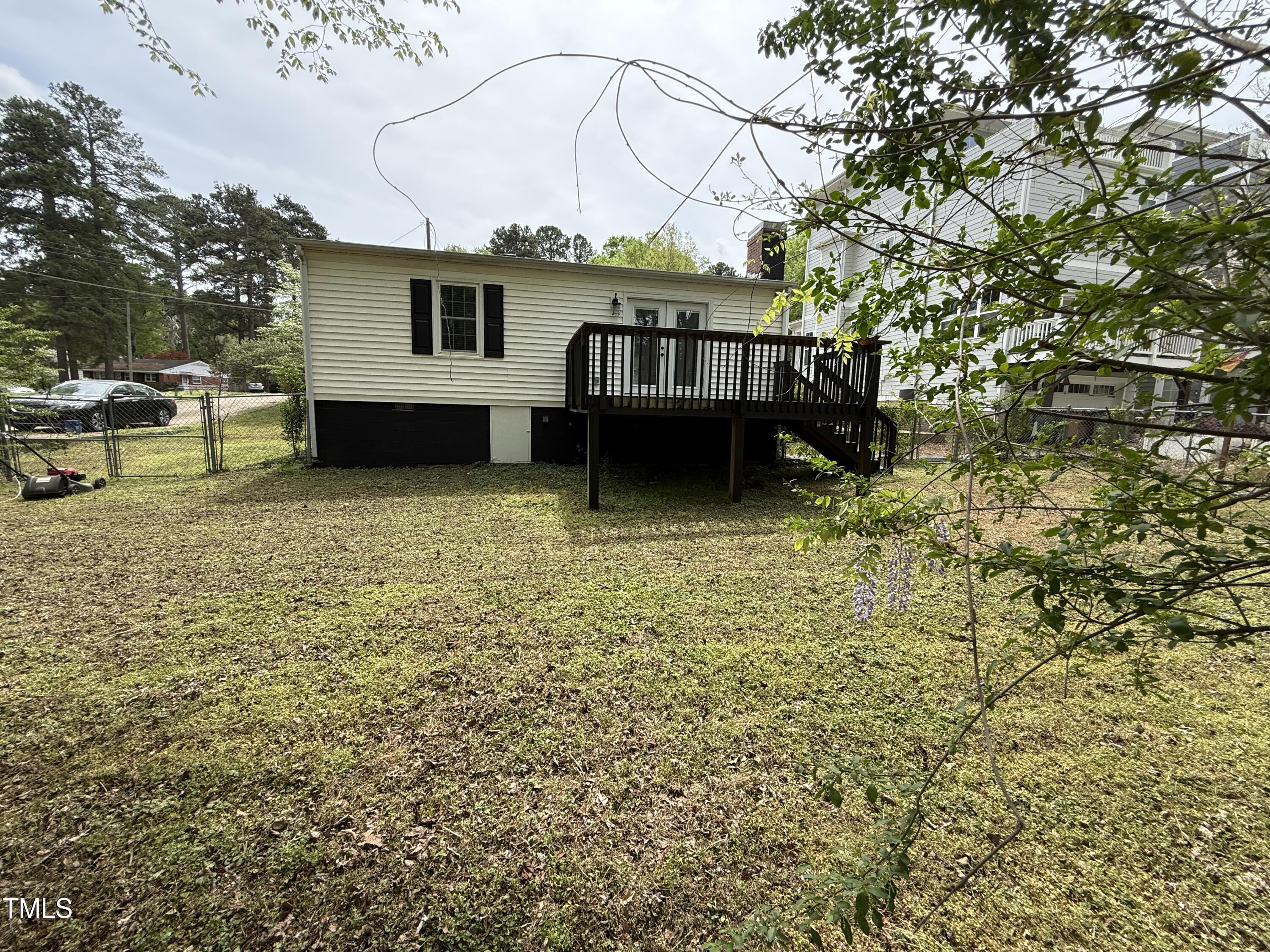215 Walnut Street Cary, NC 27511 - Photo 28 of 33 a view of backyard of house