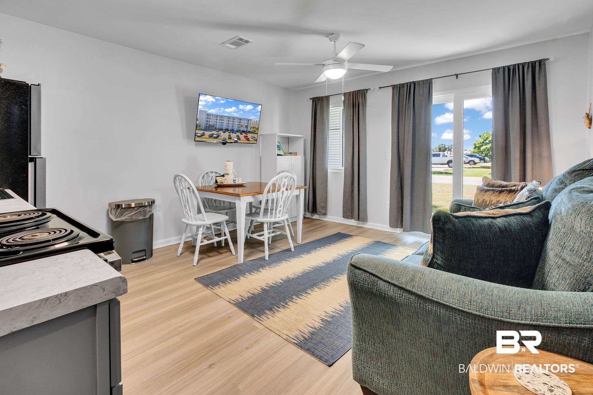 400 Plantation Road, Unit 4115 Gulf Shores, AL 36542 - Photo 8 of 48 Living room with light hardwood / wood-style flooring and ceiling fan