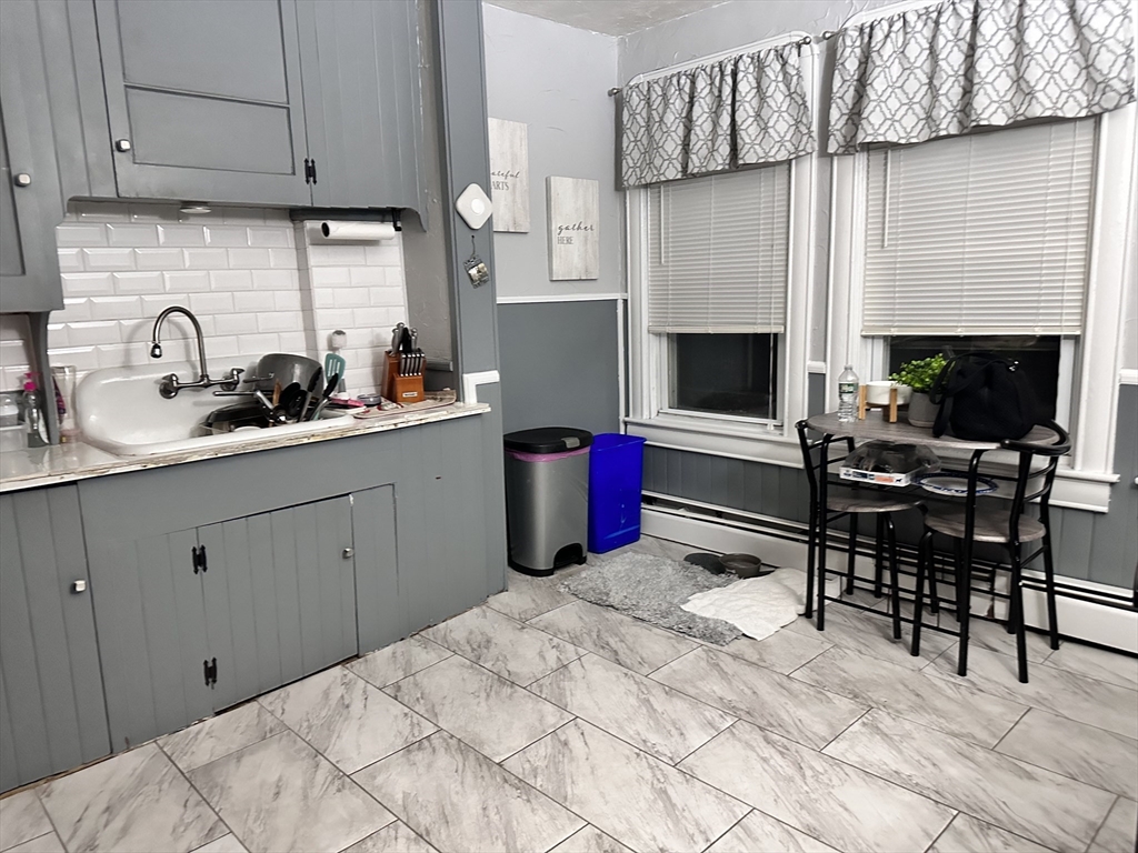 601 Anthony Street Fall River, MA 02721 - Photo 2 of 6 a kitchen with a sink cabinets and appliances