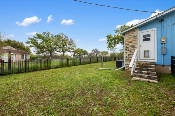 a view of a backyard with a garden