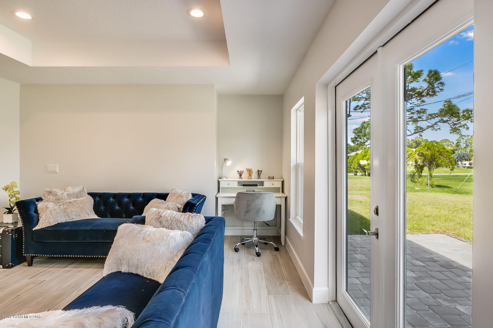 1485 Reed Street Northwest Palm Bay, FL 32907 - Photo 14 of 26 Family Room French Doors to Patio