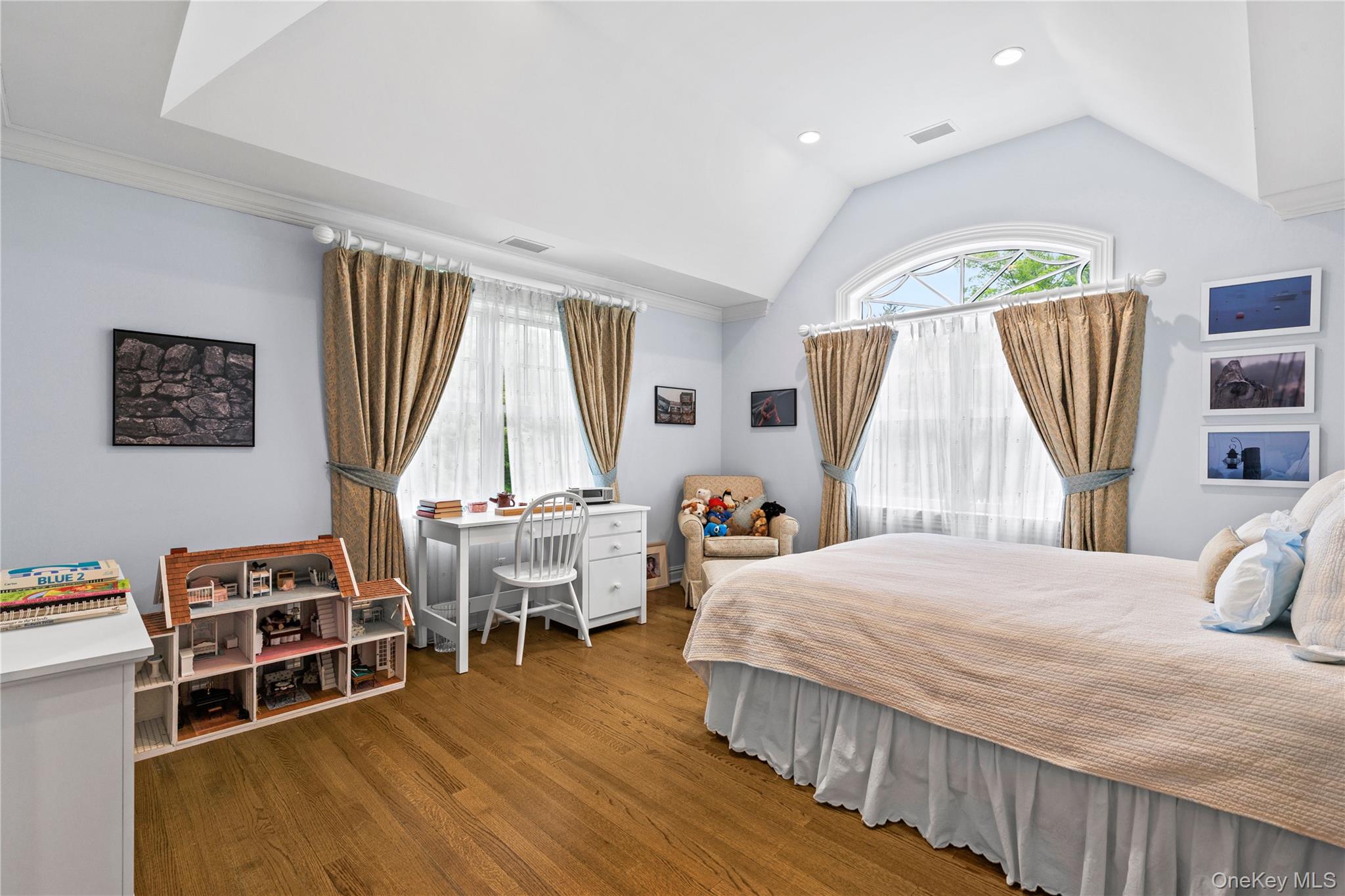 63 Old Mill River Road Pound Ridge, NY 10576 - Photo 22 of 47 a bedroom with furniture and a wooden floor