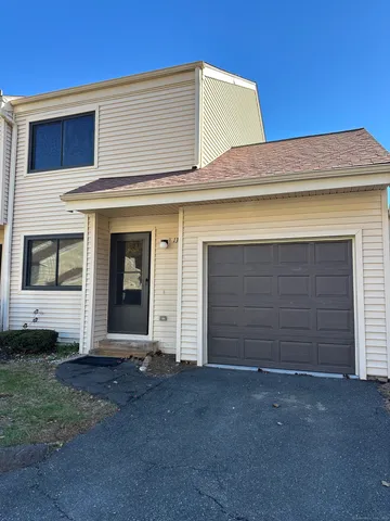 a view of a house with a garage