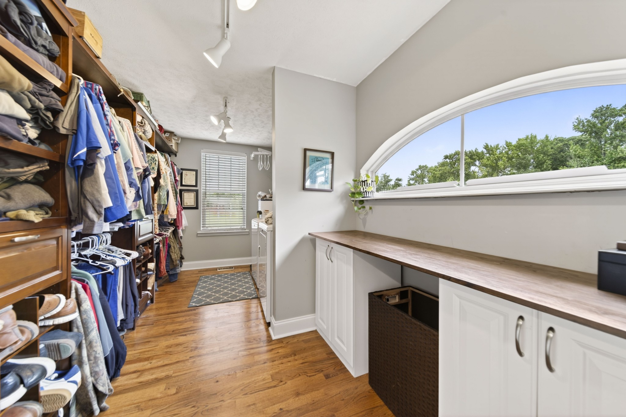 8023 Bethlehem Road Springfield, TN 37172 - Photo 43 of 55 a view of a walk in closet with clothes and shoes