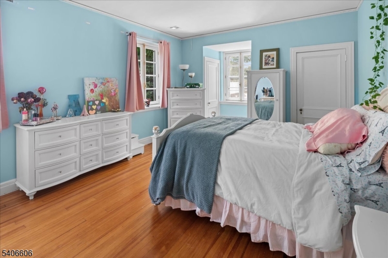 1330 Great Road Skillman, NJ 08558 - Photo 18 of 44 a bedroom with a bed and wooden floor