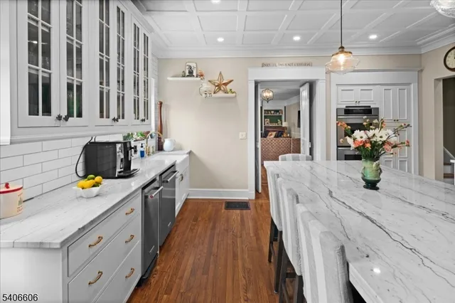 a kitchen with granite countertop lots of counter top space