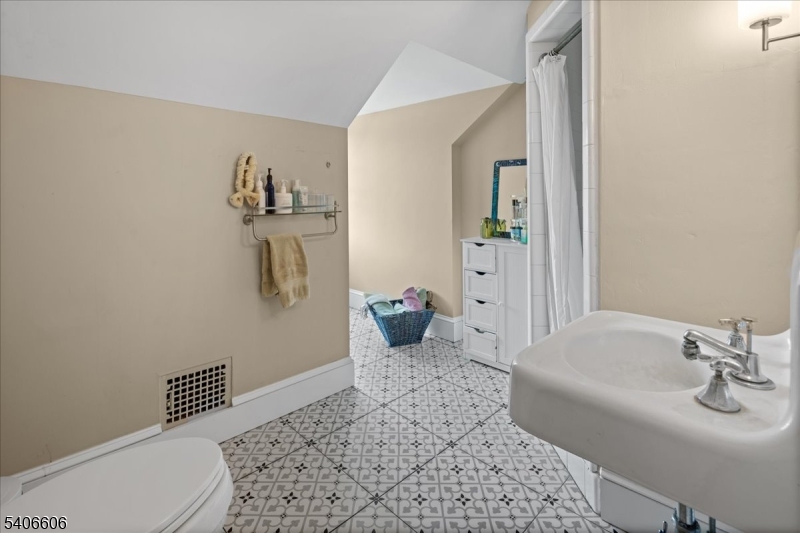 1330 Great Road Skillman, NJ 08558 - Photo 9 of 44 a bathroom with a sink a toilet and shower