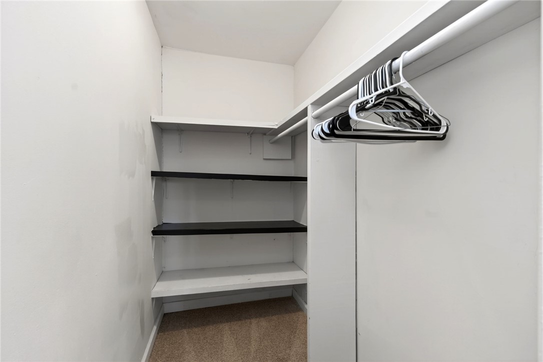 2684 Arthur Road Springfield, OH 45502 - Photo 27 of 69 This organized closet features ample shelving and a hanging rod for optimal storage solutions.