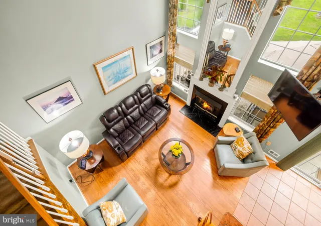 a view of a living room with a bed and a couch