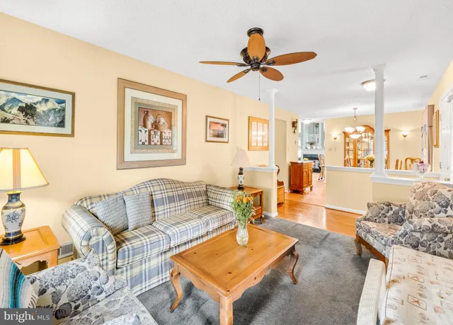 a living room with furniture and a view of living room
