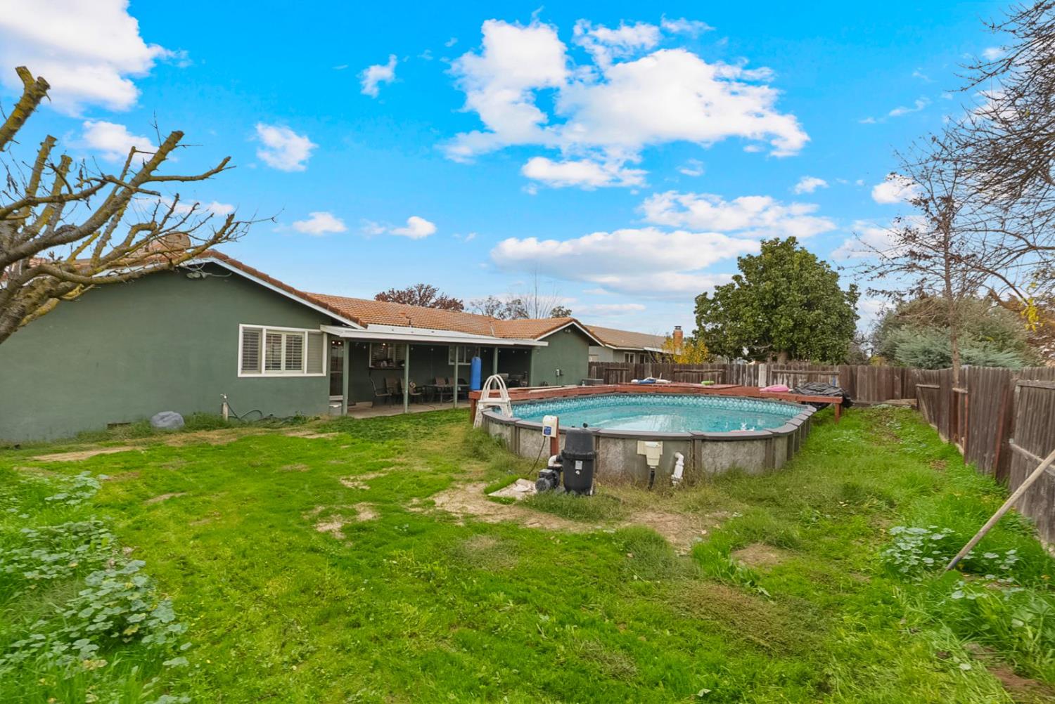 3360 Stanley Avenue Turlock, CA 95382 - Photo 16 of 17 a view of a house with a backyard