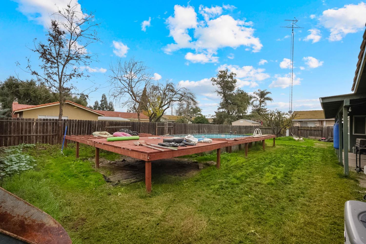 3360 Stanley Avenue Turlock, CA 95382 - Photo 17 of 17 a view of a backyard with swimming pool