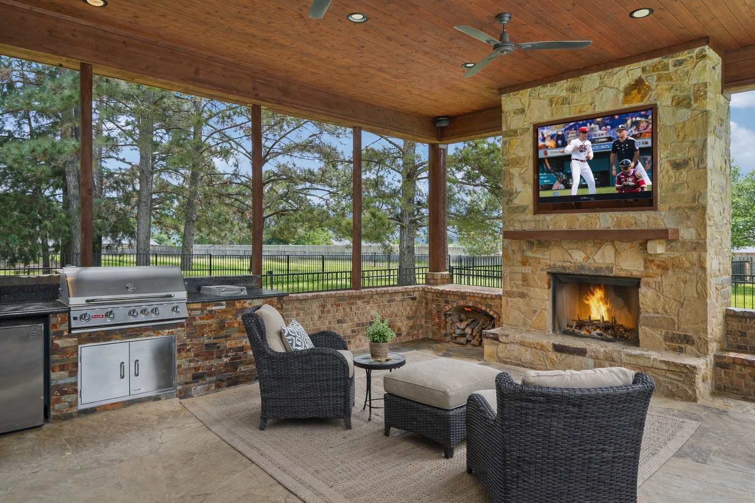 19089 Grandview Point Montgomery, TX 77356 - Photo 11 of 48 a living room with furniture a fireplace and a flat screen tv