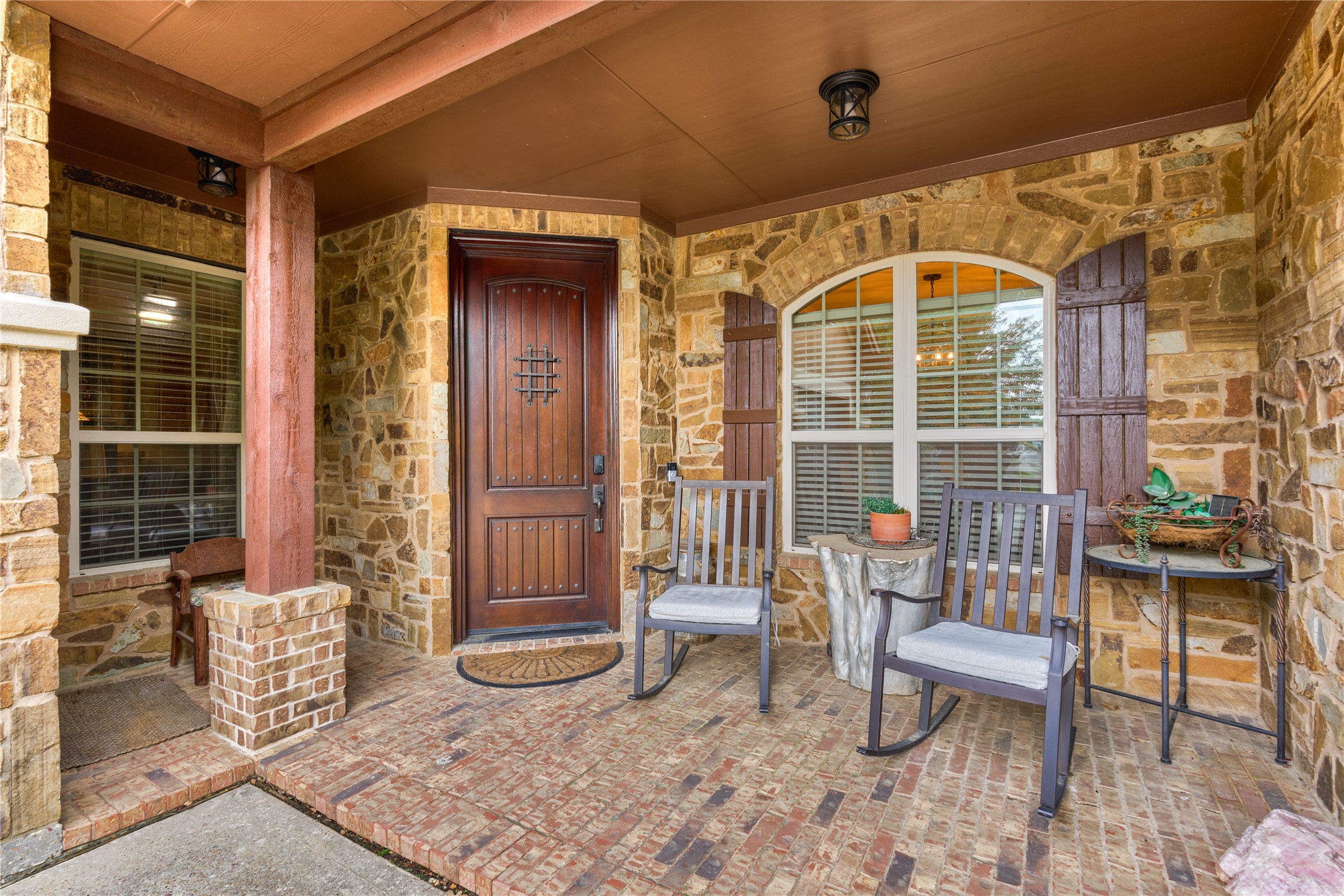 19089 Grandview Point Montgomery, TX 77356 - Photo 15 of 48 Charming front porch with rustic stonework, solid wood door. Ideal for relaxing and enjoying the view