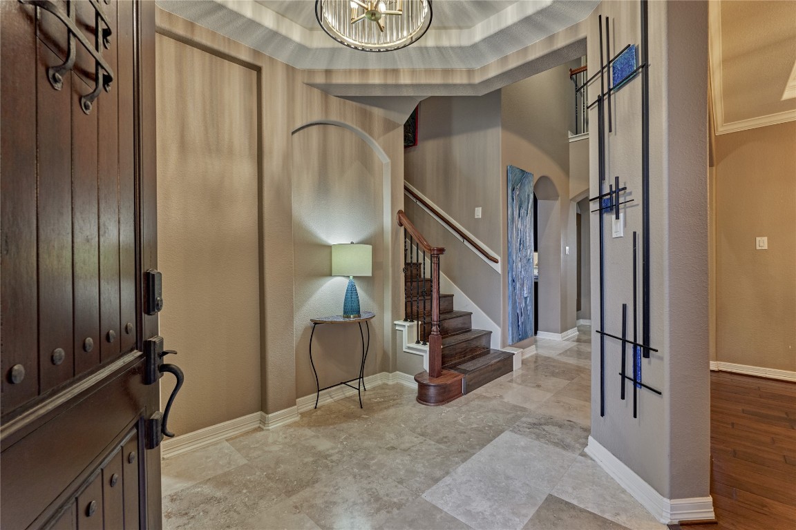 19089 Grandview Point Montgomery, TX 77356 - Photo 16 of 48 This elegant entryway features a wooden staircase with wrought iron railing