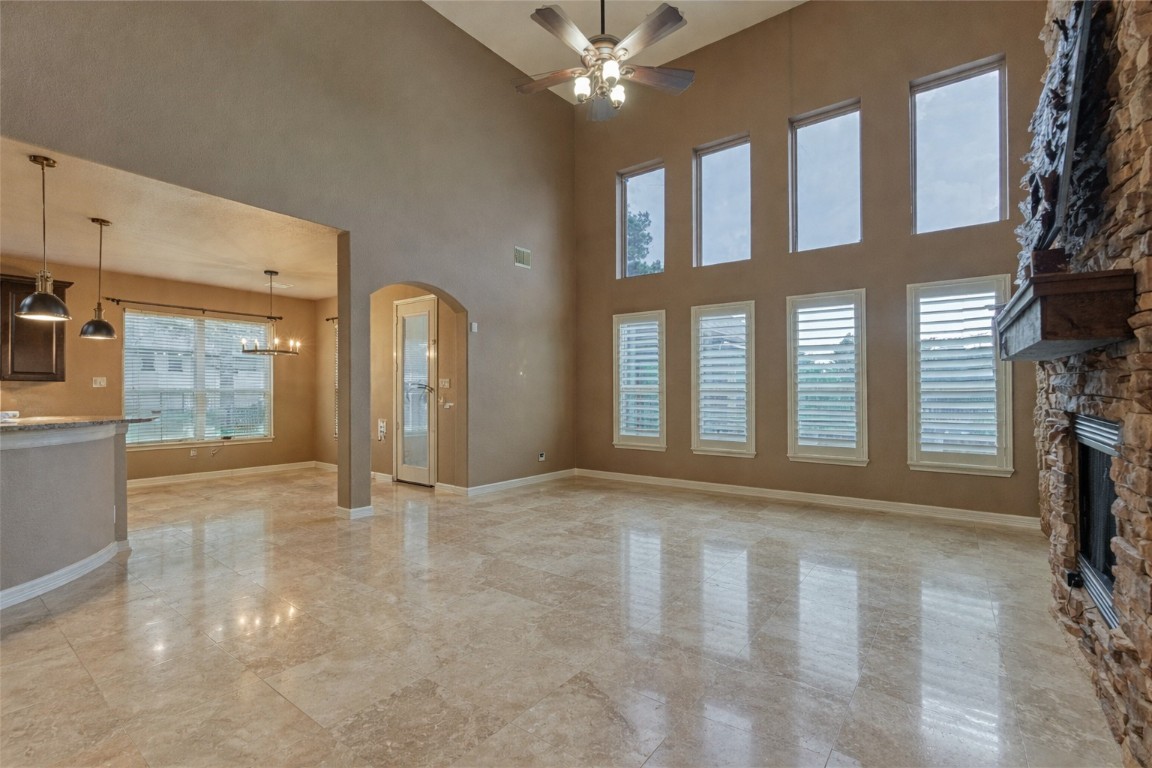 19089 Grandview Point Montgomery, TX 77356 - Photo 22 of 48 a view of an empty room with a fireplace and a window