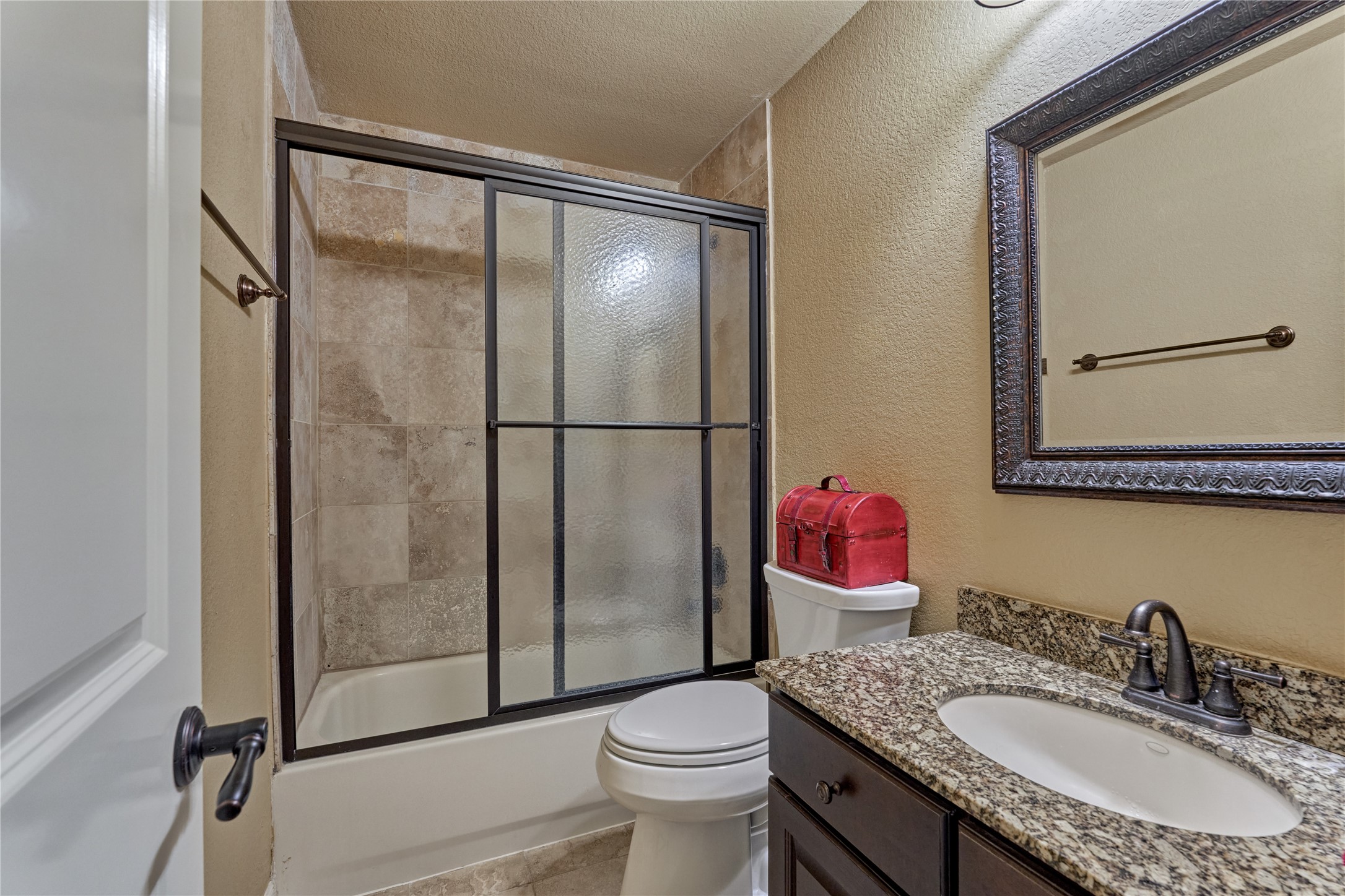 19089 Grandview Point Montgomery, TX 77356 - Photo 40 of 48 a bathroom with a granite countertop sink toilet and shower