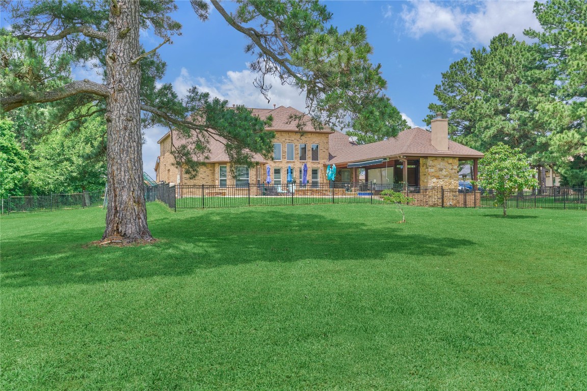 19089 Grandview Point Montgomery, TX 77356 - Photo 46 of 48 a front view of a house with a yard