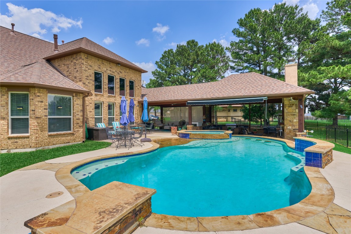 19089 Grandview Point Montgomery, TX 77356 - Photo 6 of 48 a view of a house with swimming pool and sitting area
