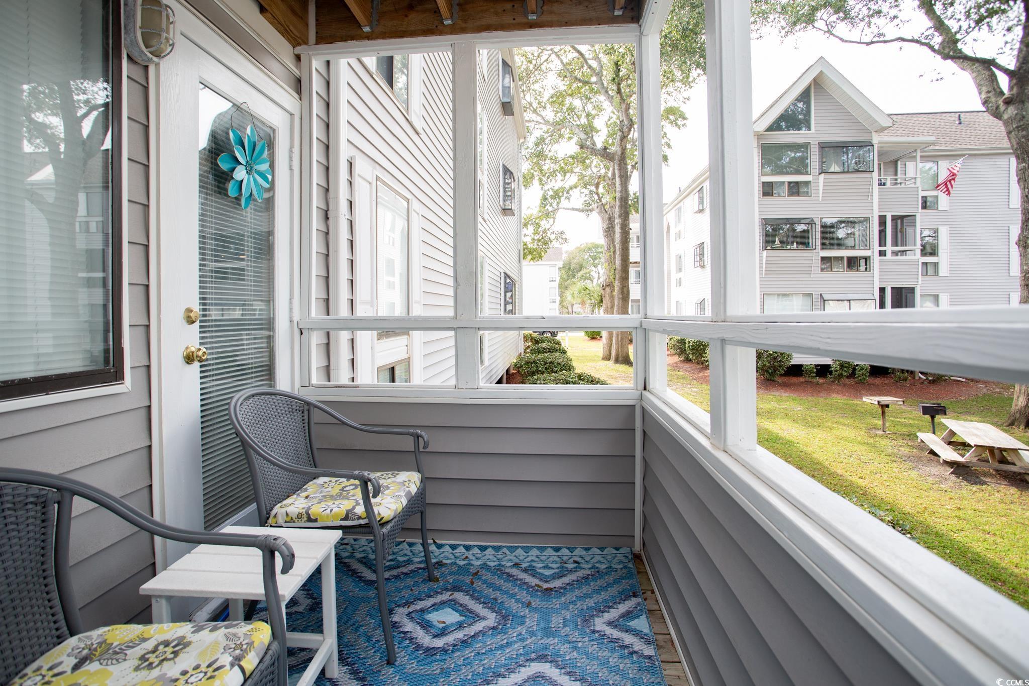 351 Lake Arrowhead Road, Unit 25404 Myrtle Beach, SC 29572 - Photo 24 of 37 View of sunroom / solarium