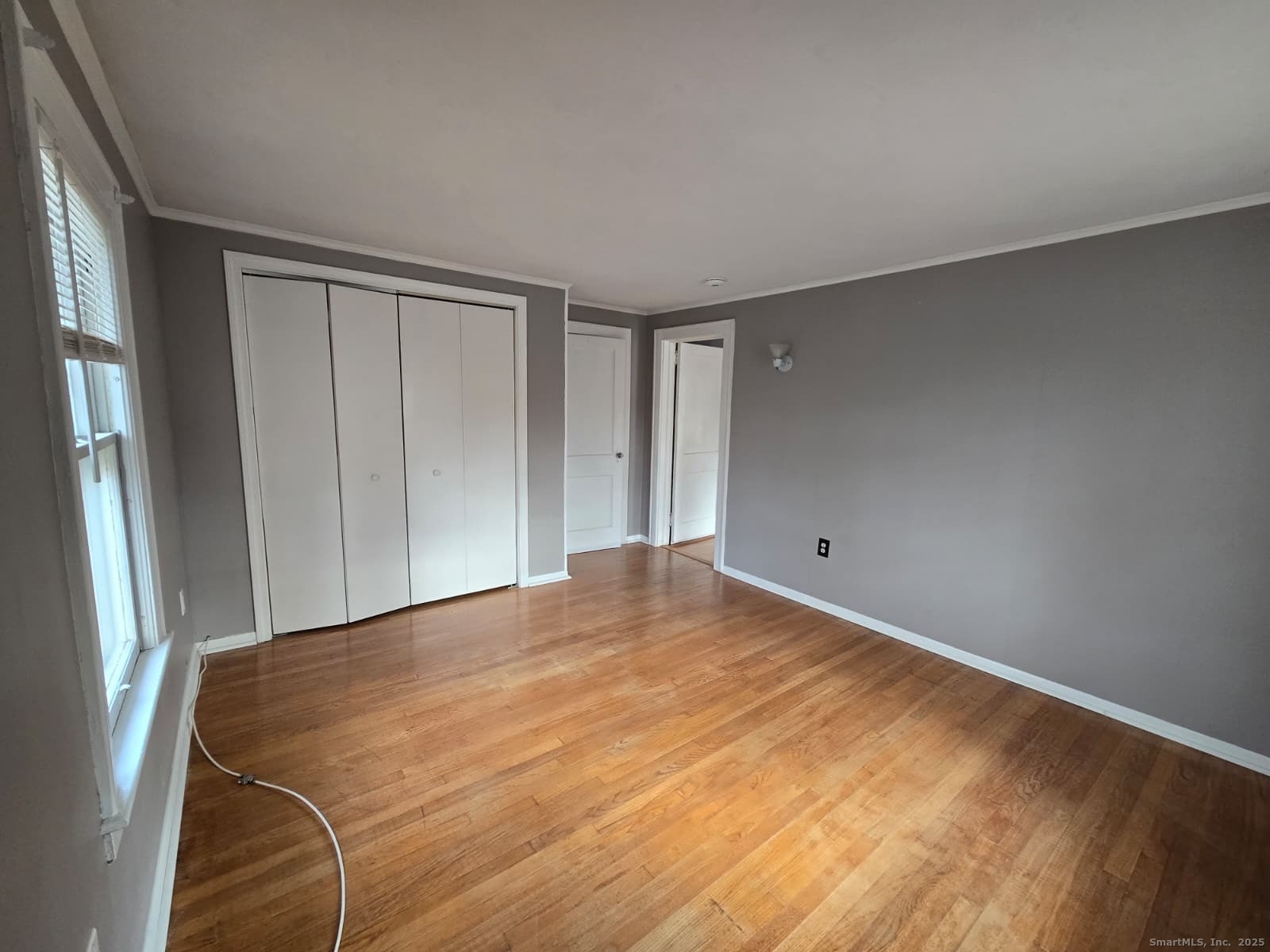 116 Hillside Avenue Middletown, CT 06457 - Photo 2 of 9 a view of a room with a wooden floor