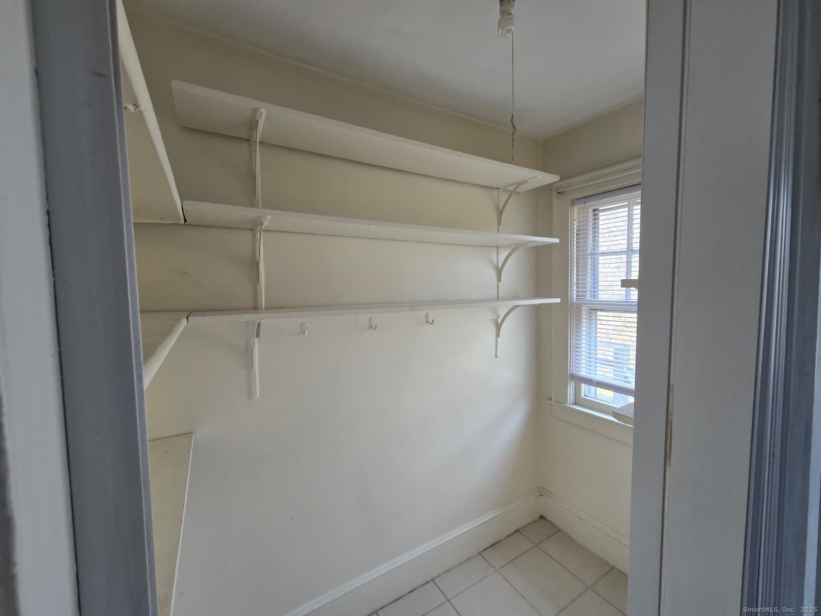 116 Hillside Avenue Middletown, CT 06457 - Photo 9 of 9 a view of an empty walk in closet