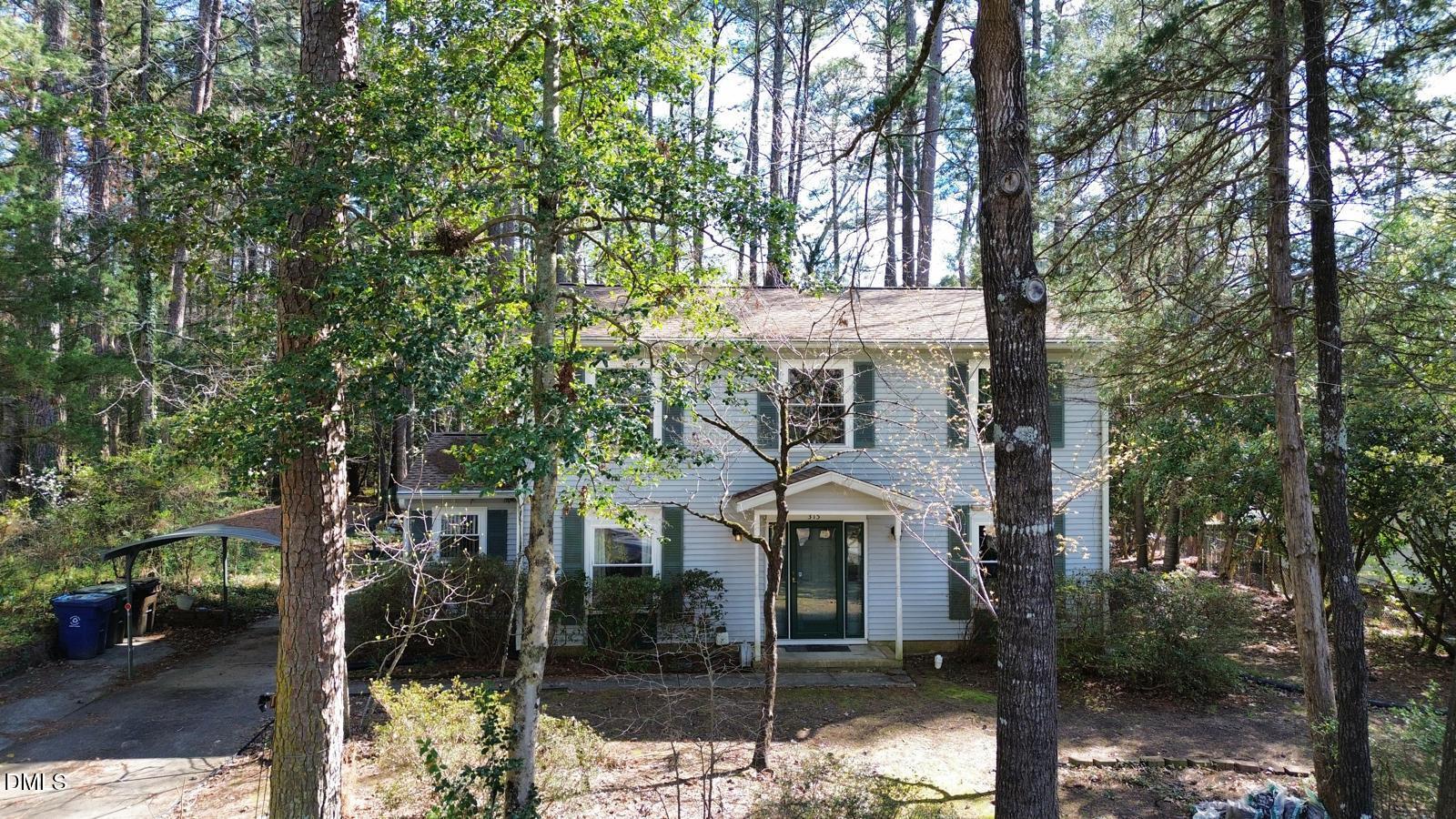315 Hemming Way Durham, NC 27713 - Photo 1 of 21 a view of a house with a tree