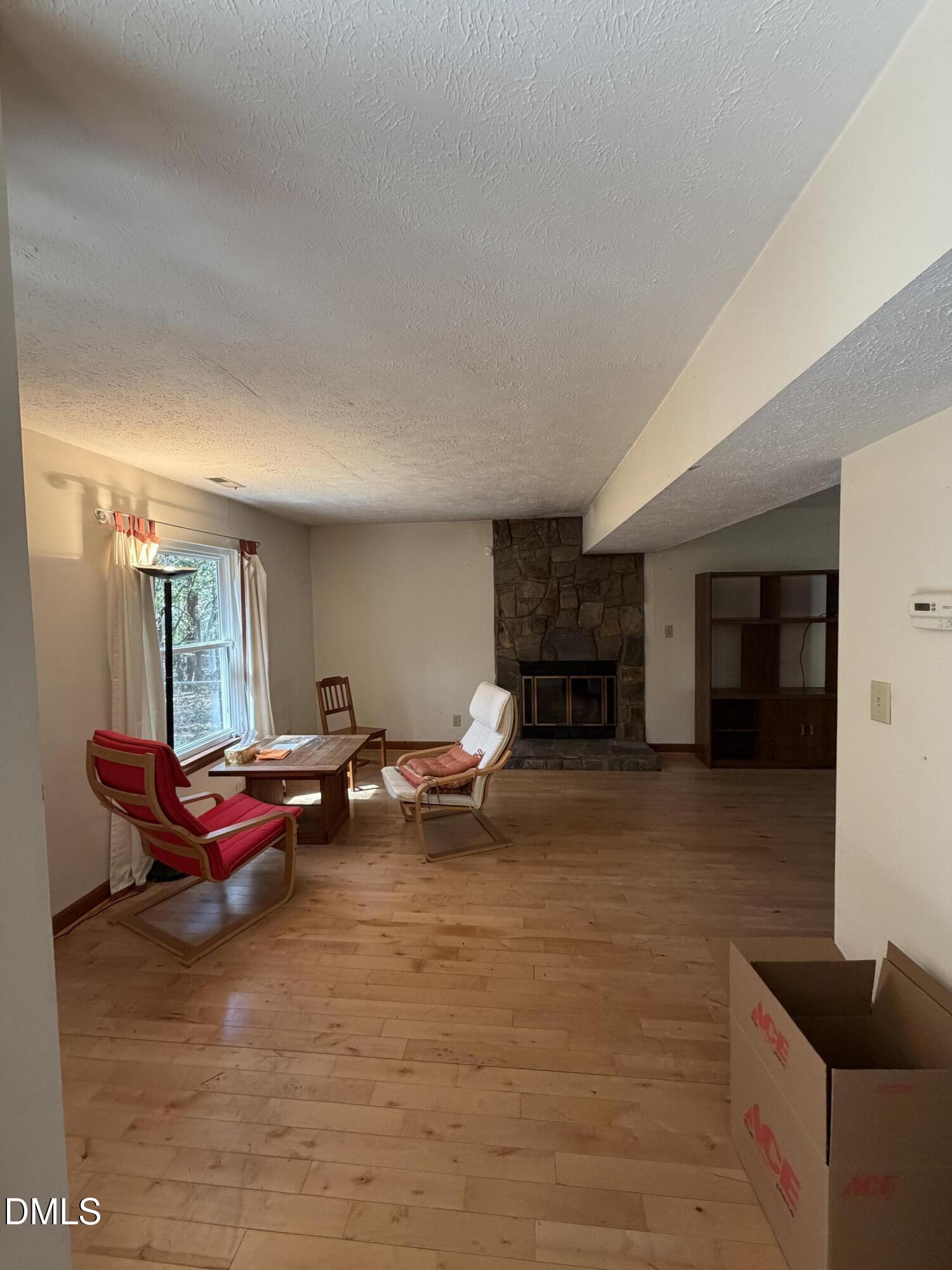 315 Hemming Way Durham, NC 27713 - Photo 10 of 21 a living room with furniture and a fireplace