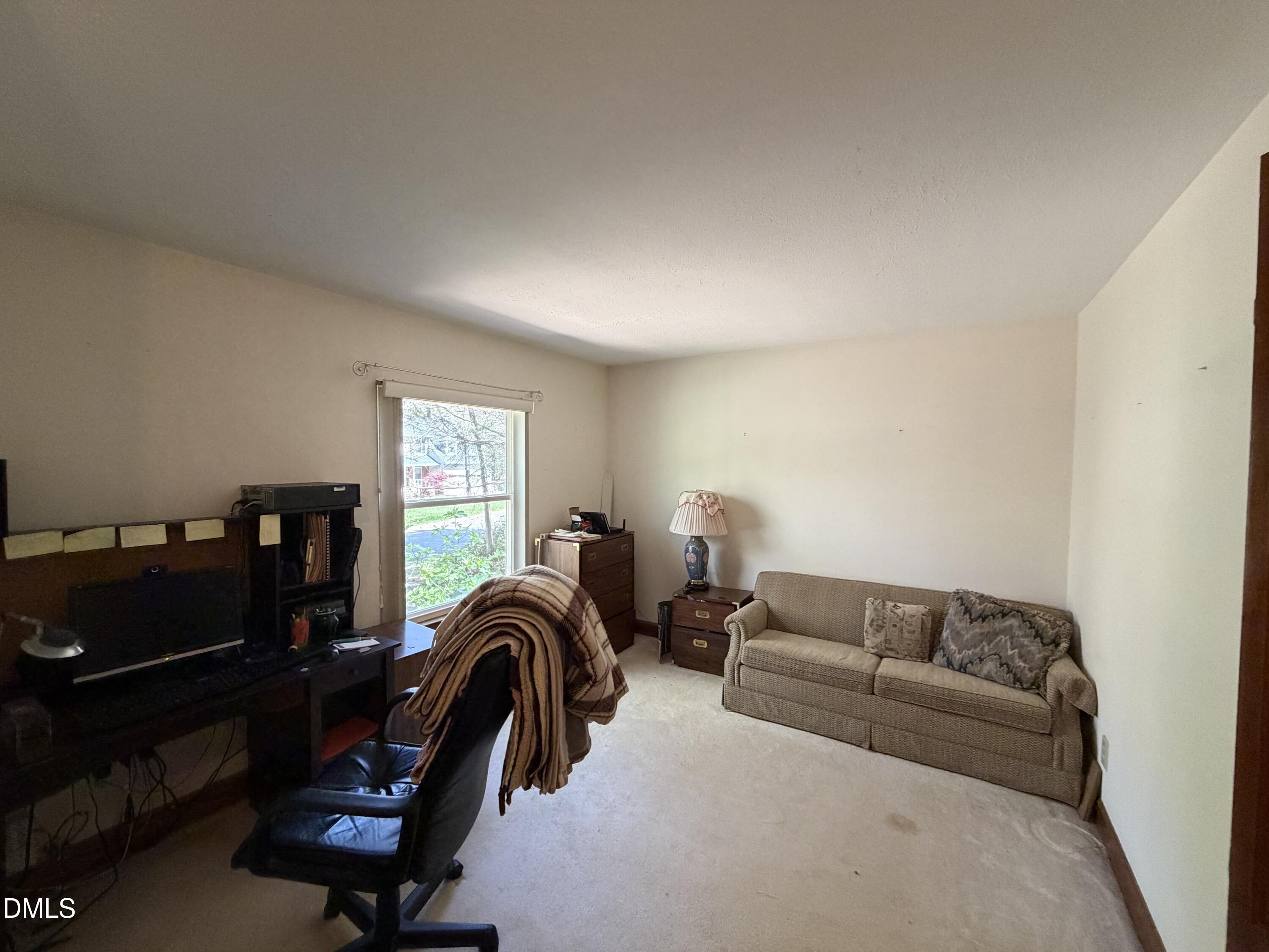315 Hemming Way Durham, NC 27713 - Photo 16 of 21 a livingroom with furniture and a window